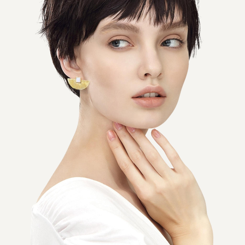 Egyptian Palm Leaf Shape Gold Stud Earrings on model