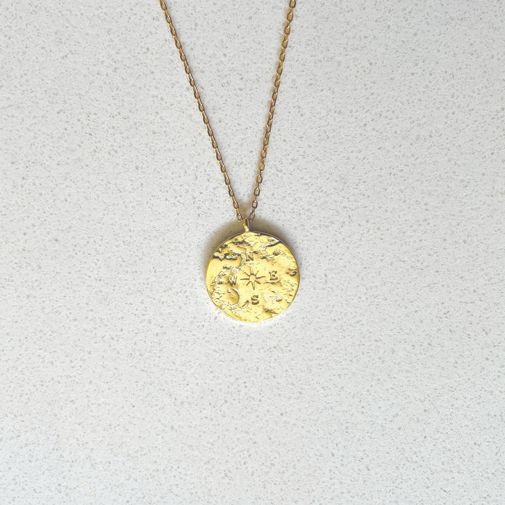a photo of Compass Coin Pendant Necklace from Beyond Bling Jewellery
