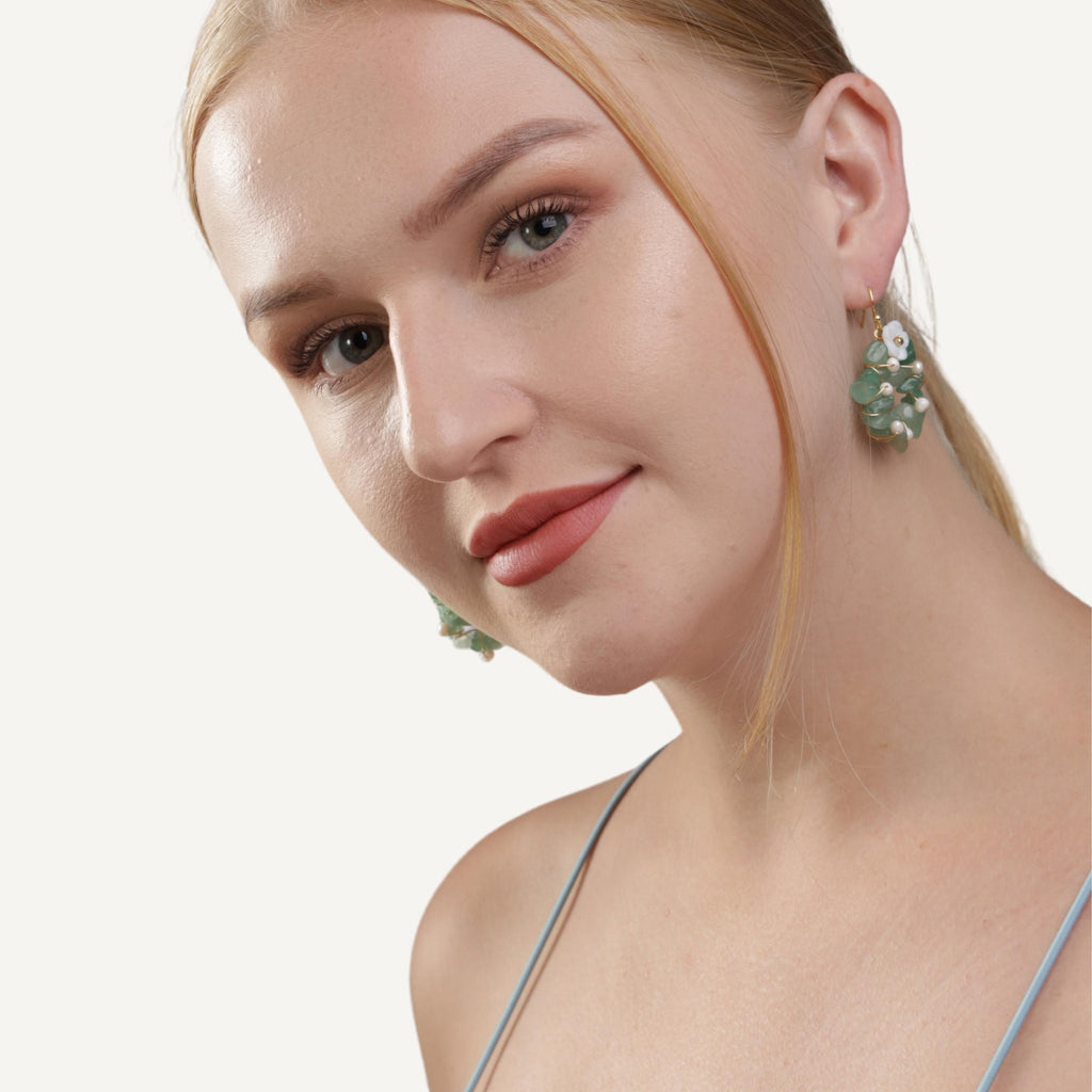an image of a model wears Dangle Jade Flower Earrings from Beyond Bling Jewellery