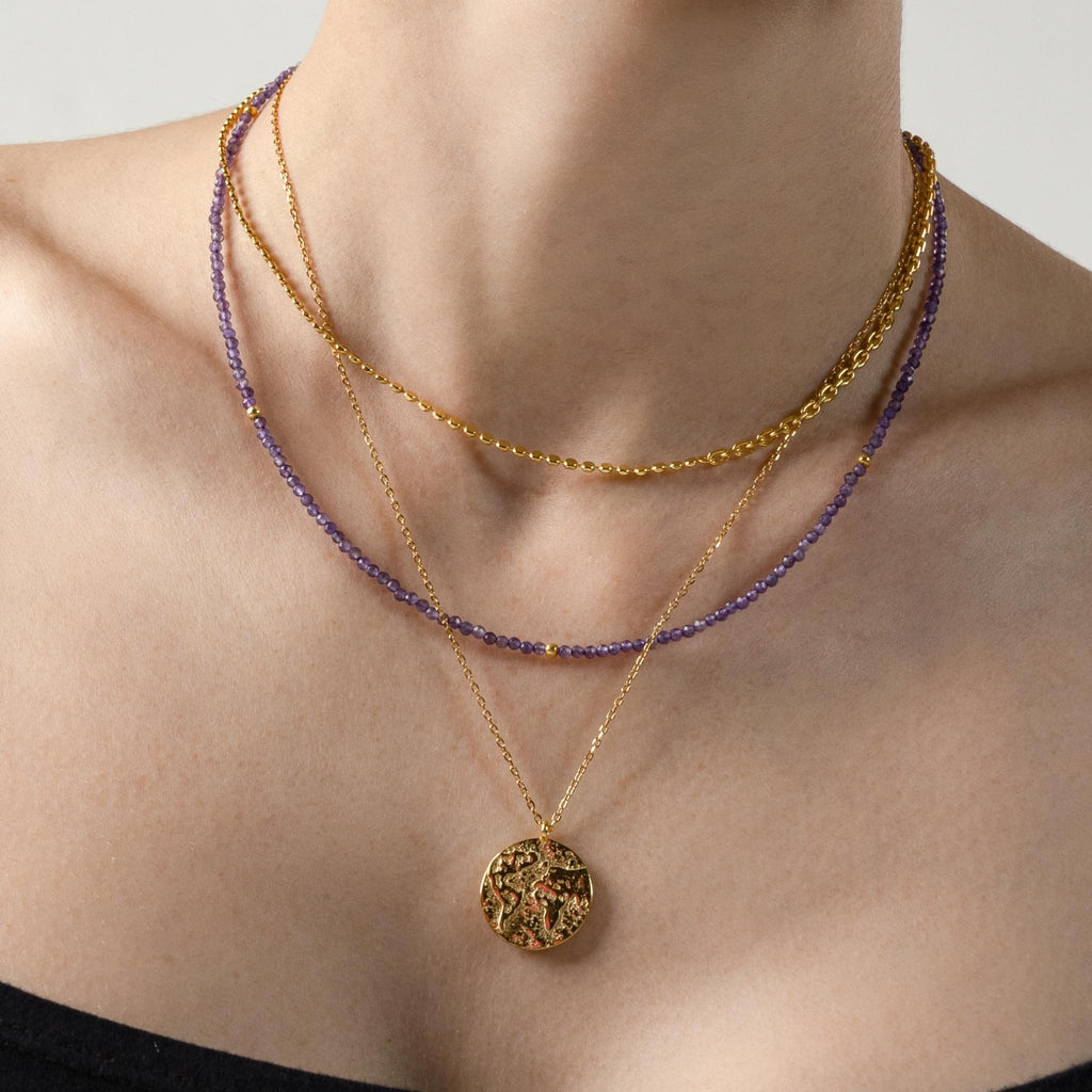 a photo of a model wear Amethyst Gemstone Beaded Necklace on Beyond Bling Jewellery website