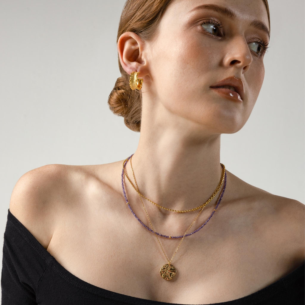 a photo of a model wear Amethyst Gemstone Beaded Necklace on Beyond Bling Jewellery website
