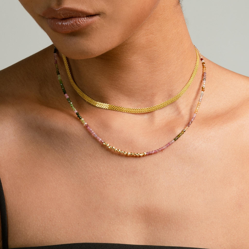 a photo of a model wears Watermelon Tourmaline Gemstones Beaded Necklace on Beyond Bling Jewellery website